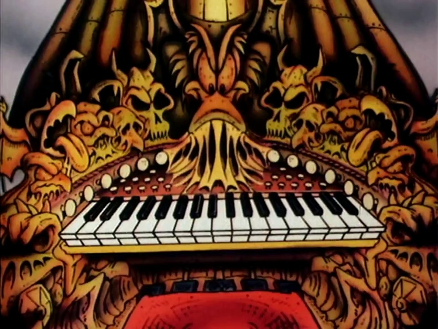 Ornate cartoon pipe organ decorated with skulls, gargoyles and a horned monster face.