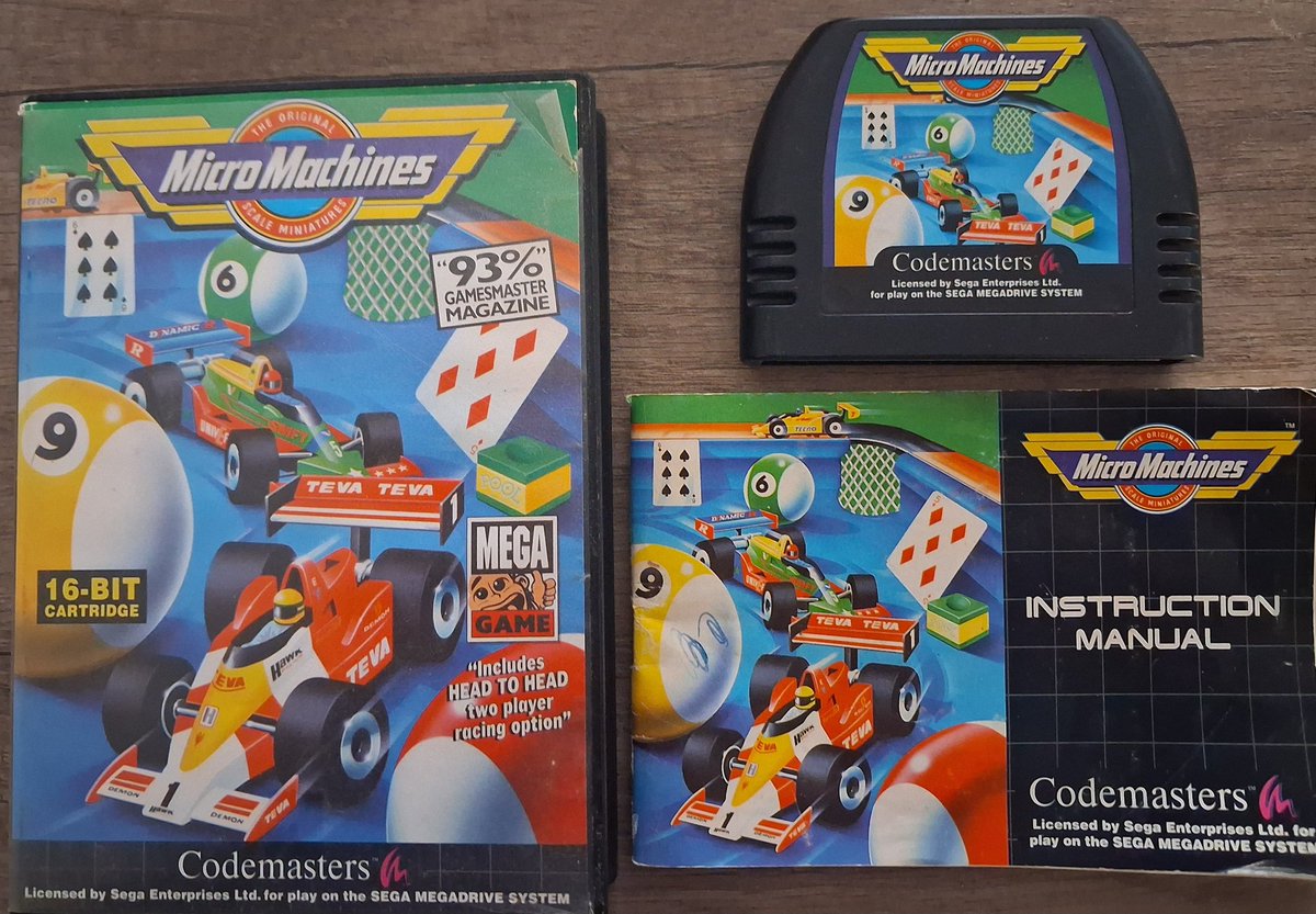 Sega Mega Drive Micro Machines game box, cartridge, cover insert and instruction manual.