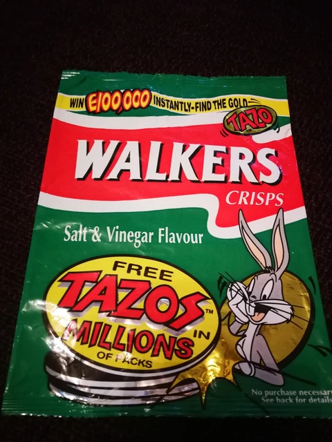 Walkers salt and vinegar crisps packet advertising a free Looney Tunes Tazo inside.
