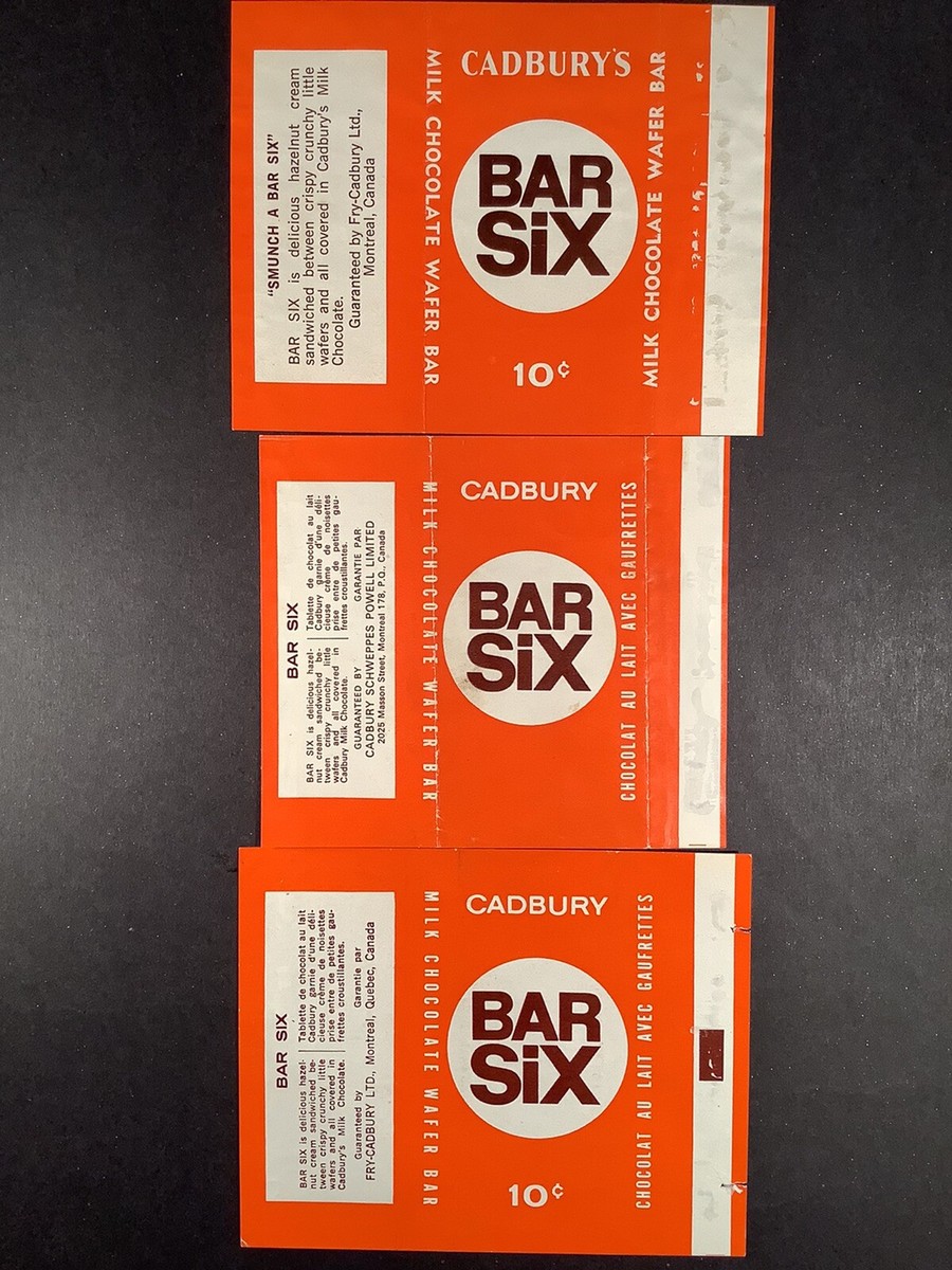Three flattened orange Cadbury Bar Six wrappers arranged vertically on a dark surface, with white circles containing the brown “BAR SIX” logo, bilingual English and French text, and 10-cent prices on the top and bottom wrappers.