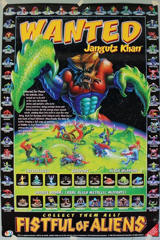 Portrait-oriented illustrated Fistful of Aliens collector poster with a large orange-and-yellow “WANTED” headline above the character Jangutz Khan, a muscular horned alien holding two green creatures. Small character illustrations and names run around the black border, with illustrated alien vehicle.
