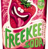 Close-up of Freekee Soda packaging featuring a smiling strawberry character with a green leaf cap and pink tongue.