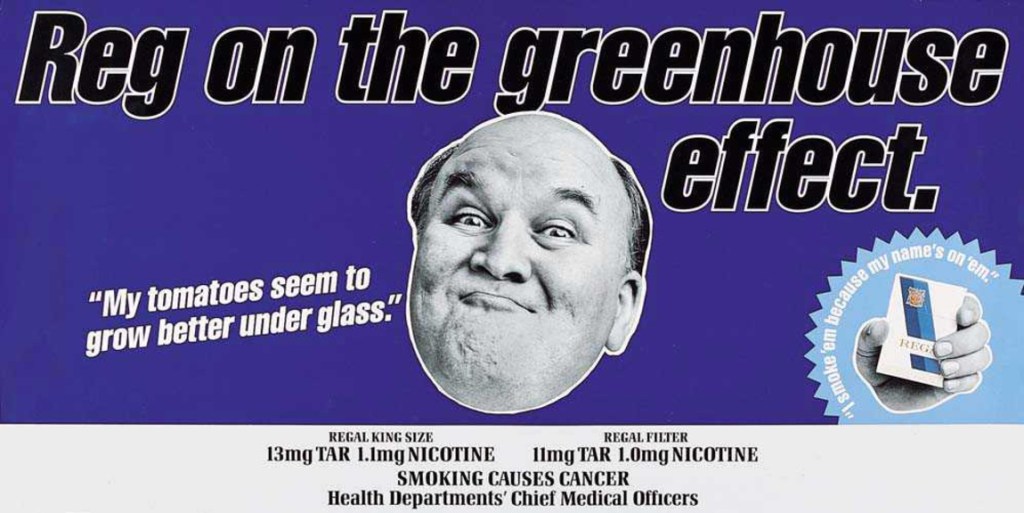Purple Embassy Regal cigarette advert headed “Reg on the greenhouse effect.” A black-and-white cut-out portrait of Reg appears beside the line “My tomatoes seem to grow better under glass.” and a hand holding a Regal pack. Tar, nicotine and smoking warning text runs along the bottom.