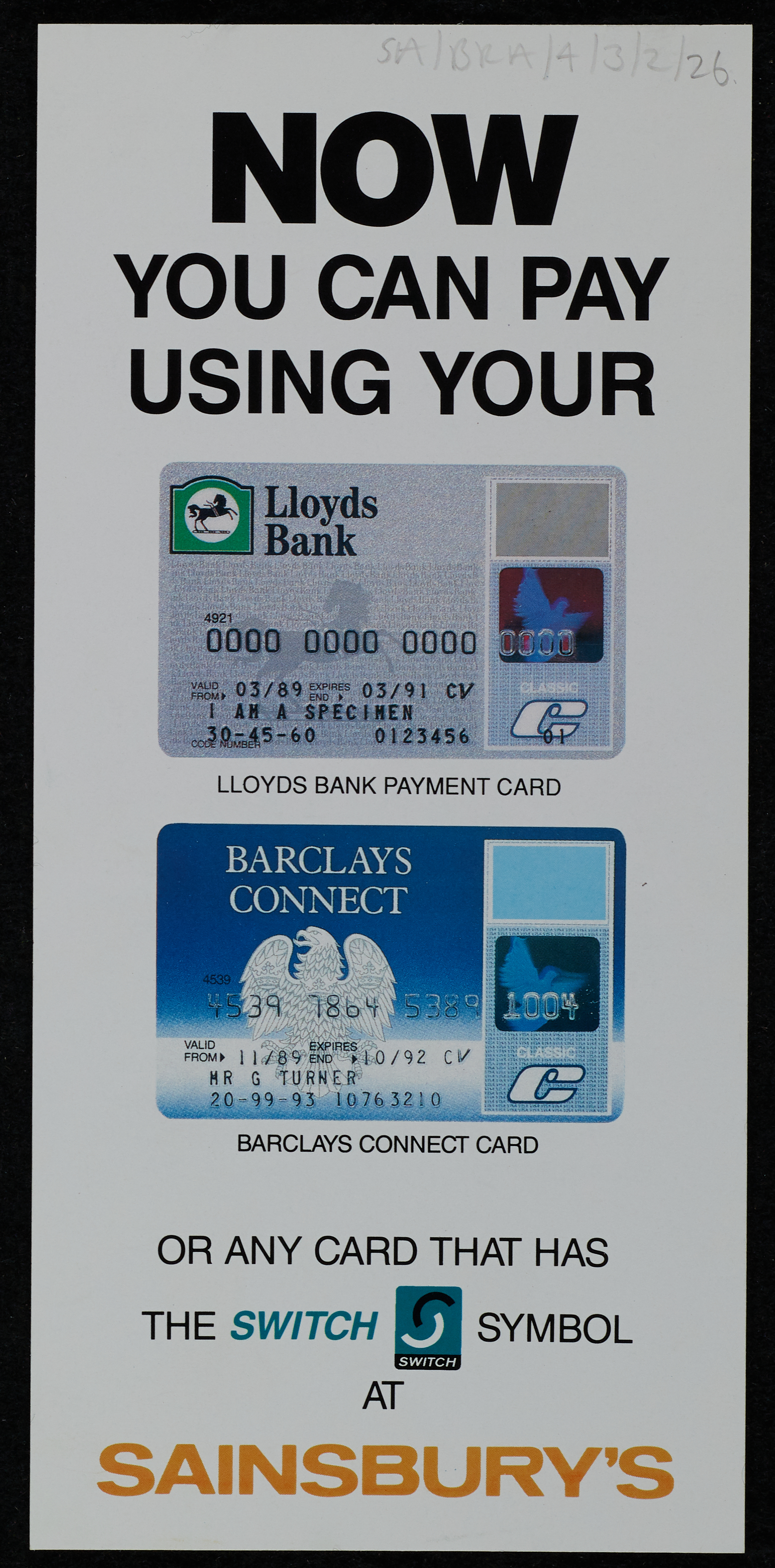 Vertical printed sign reading “Now you can pay using your” above specimen Lloyds Bank and Barclays Connect payment cards, followed by text saying cards with the Switch symbol can be used at Sainsbury’s.