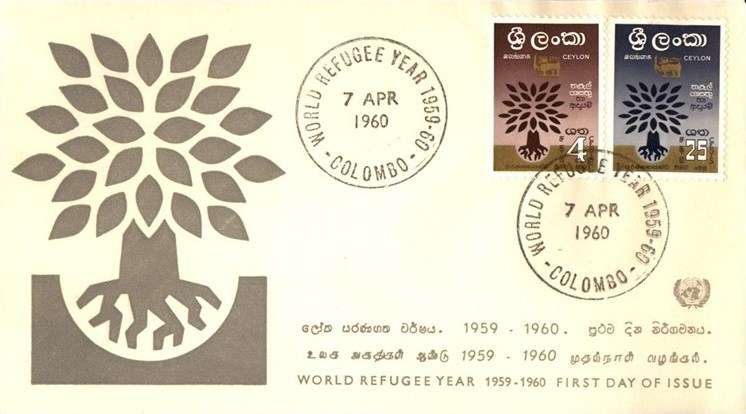 Cream-colored first-day cover with a large stylized tree-and-roots symbol at left and two Ceylon stamps at upper right, one brown and one blue.