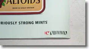 A CueCat barcode printed on an Altoids advertisement in Wired. Scanning it was intended to open the associated website automatically.