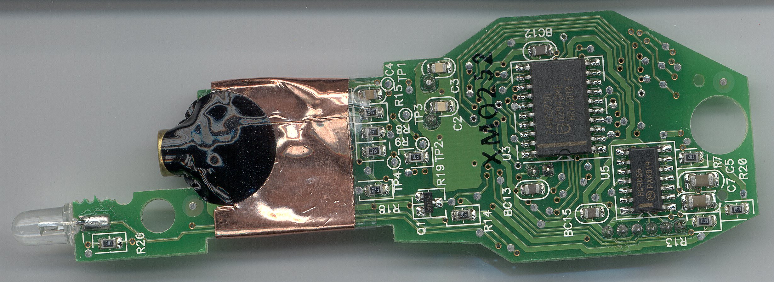 Inside a CueCat scanner. Users quickly developed hardware and software modifications that repurposed the free devices as general-purpose barcode readers.