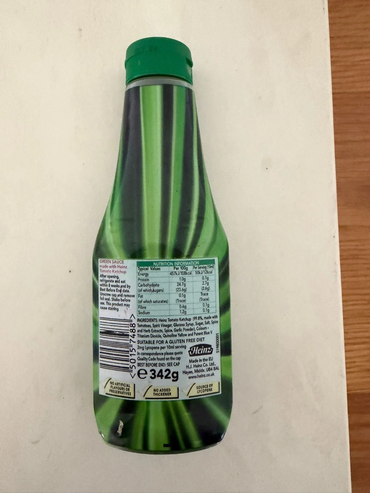 Rear view of the Heinz Green Sauce bottle, showing its ingredients, nutritional information and barcode.