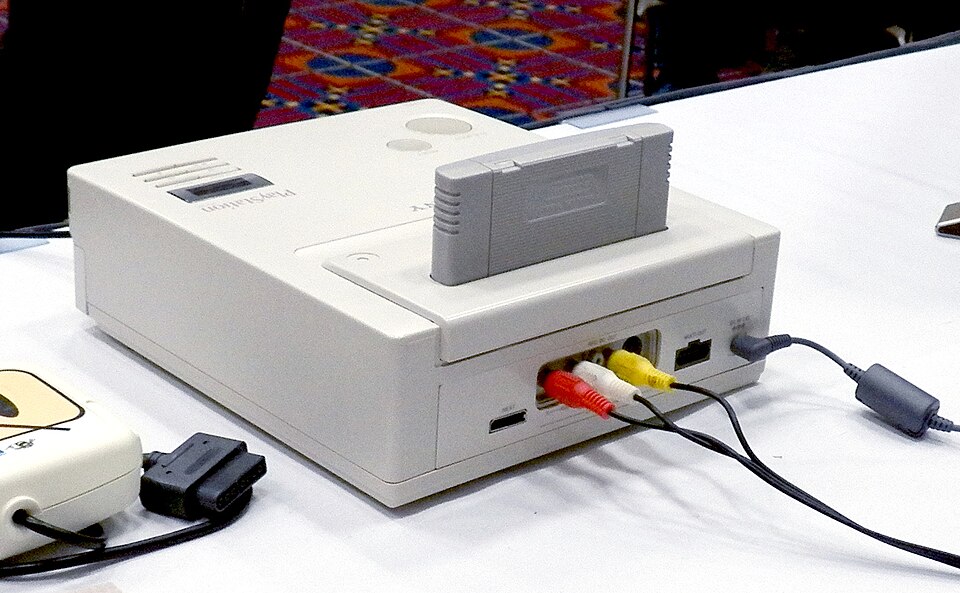 The prototype’s rear connections, with a cartridge inserted above its built-in CD drive.