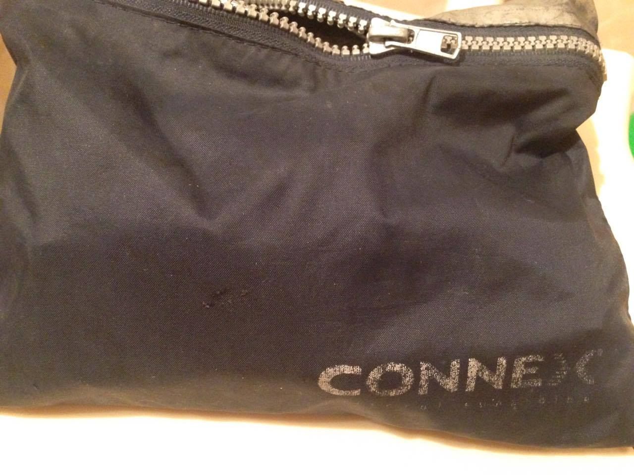 The detachable CONNEX-branded phone pocket built into the MY X clothing concept.