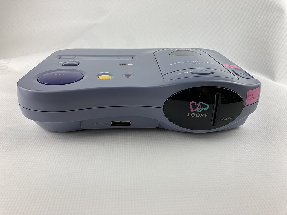 Viewed on its own, the Loopy’s unusual body placed the cartridge slot and thermal printer beside large, toy-like controls.