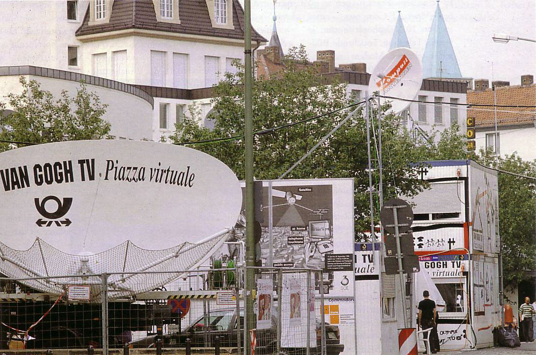 Satellite dish marked Van Gogh TV – Piazza virtuale beside the project’s outdoor broadcasting installation.