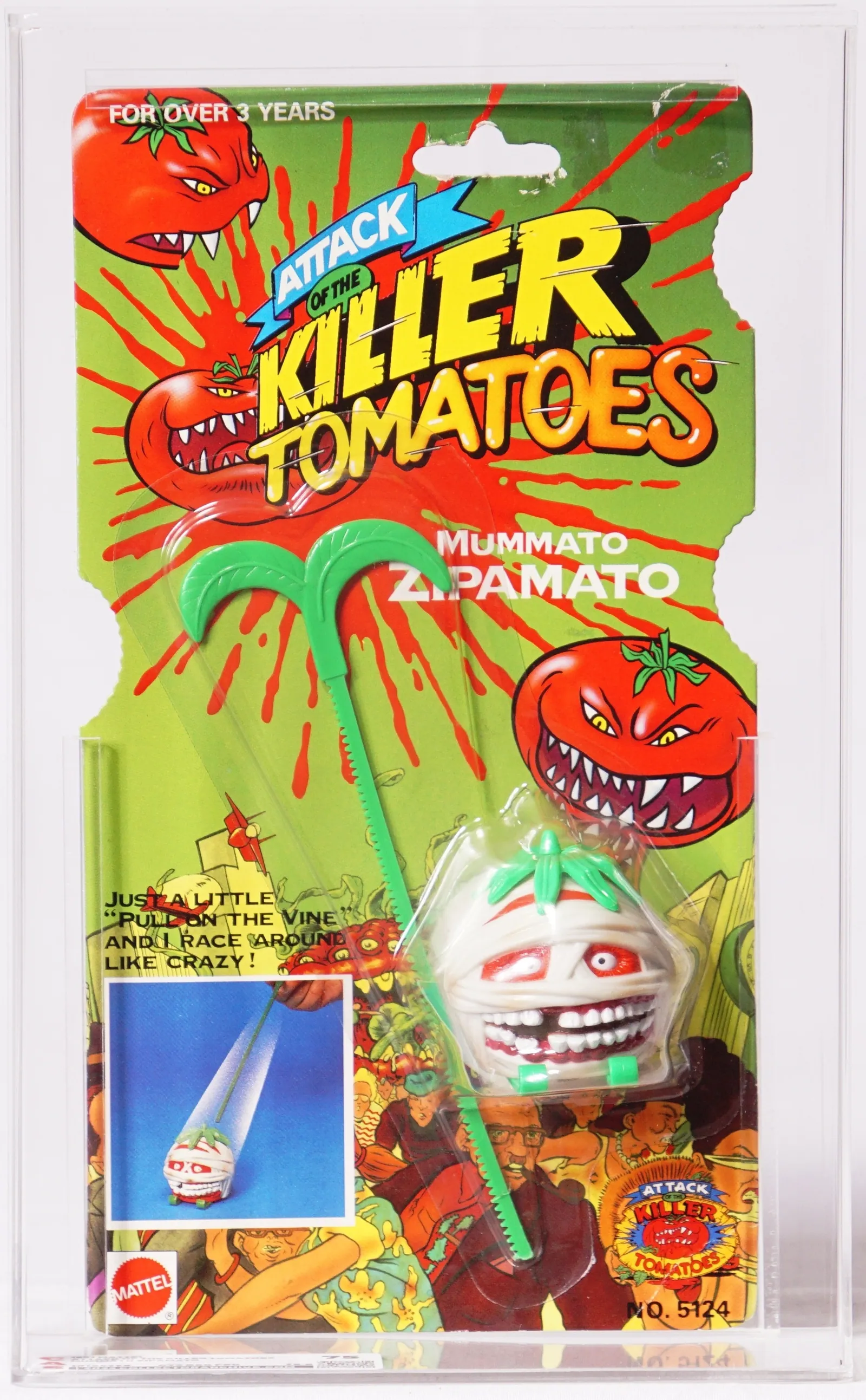 Close-up photograph of the upper and middle front of a sealed Attack of the Killer Tomatoes Mummato and Zipmato package in a clear protective case, showing the green card, red splatters, title logo, bandaged tomato figure, green accessory, and part of the blister.