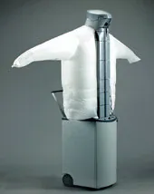 Siemens dressman appliance with a pale inflated torso and outstretched short sleeves on a tall grey wheeled base.