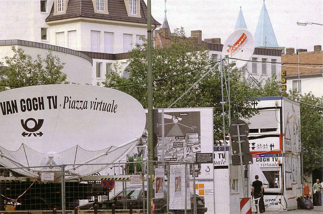 Satellite dish marked Van Gogh TV – Piazza virtuale beside the project’s outdoor broadcasting installation.